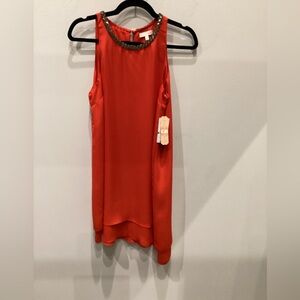 Vibrant Orange Satin asymmetrical cocktail dress.